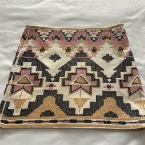 Pink gold and black sequin skirt.